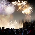 crowd watching fireworks - New Year celebrations- abstract holiday background