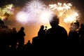 crowd watching fireworks - New Year celebrations- abstract holiday background