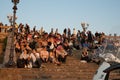 Crowd watching the setting sun. Royalty Free Stock Photo