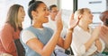 Crowd, women applause and meeting seminar, workshop and smile for happiness, celebrate or event. Group, people or award Royalty Free Stock Photo