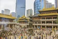 A crowd of worshipers in Buddhist temple Jing`an in Shanghai