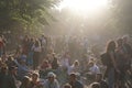 Crowd of young people outdoors in park at sunshine