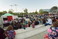 Crowd of young people sitting on a concert of an orchestra at park Rike during festival in Tbilisi Royalty Free Stock Photo