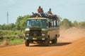 Crowded African Public Bus on the Dusty Road in the heart of Ghana