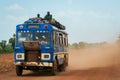 Crowded African Public Bus on the Dusty Road in the heart of Ghana Royalty Free Stock Photo