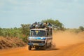 Crowded African Public Bus on the Dusty Road in the heart of Ghana Royalty Free Stock Photo