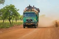 Crowded African Public Bus on the Dusty Road in the heart of Ghana