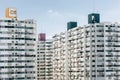 Crowded apartment tower in modern downtown city metro poor crowd people home living in high density building lifestyle Royalty Free Stock Photo