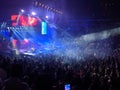 A crowded arena and concert scene