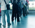 Crowded Asian commuters queuing at train station in Singapore Royalty Free Stock Photo