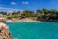 Crowded beach Cala Esmeralda in Cala d`Or, Mallorca during summer season Royalty Free Stock Photo