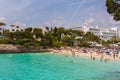 Crowded beach Cala Gran in Cala d`Or, Mallorca during summer season Royalty Free Stock Photo