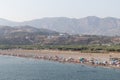 Crowded beach in front of the mountains in SalobreÃÆÃÂ±a, Andalusia, Spain