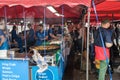 Crowded busy market with people buying food in Bergen, Norway