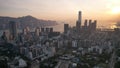 Crowded city and harbor view during sunset in Hong Kong Royalty Free Stock Photo