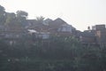 crowded houses between hillsides in lembang early morning