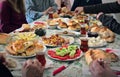 Muslim family having breakfast together celebrating eid-ul-fitr after Ramadan