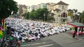 Crowded Muslim people pray near Koinonia Church