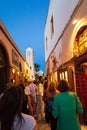 Crowded night streets of Oia town Santorini Greece