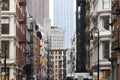 Crowded old buildings at the intersection of Broome and Greene Streets in SoHo New York City