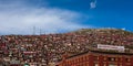 Crowded Red House of Buddhist Academy Royalty Free Stock Photo