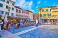 The crowded restaurants on Piazza Giosue Carducci, Sirmione, Italy