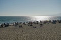 Crowded Santa Monica beach with tourist and families enjoying the summer