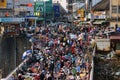 Crowded scene at market with crowd of people