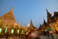 Crowded Shwedagon Pagoda full of Tourists and local Devotees in the evening during sunset