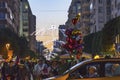 Crowded street, excited people and balloon seller at Orange Blossom Festival in Adana Province of Turkey