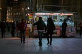 A crowded street food kiosk selling in the night of Milan Royalty Free Stock Photo