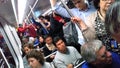 Crowded subway car melting pot