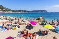 Crowded summer beach in Villefranche-sur-Mer, Nice, France