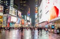 Crowded Times Square in Manhattan New York at Night. Bright LED Screens and Billboards. Urban Street Photography Royalty Free Stock Photo
