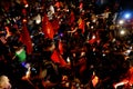 Crowded Vietnamese street at night, young people ride motorbike in traffic jam Royalty Free Stock Photo