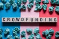 Crowdfunding word concept on cubes