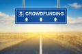 Crowdfunding words on blue road sign Royalty Free Stock Photo