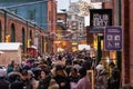Crowds fill the Distillery District at Christmas time with festive lights and decorations