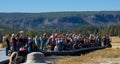 Crowds Gather to Watch Old Faithful Erupt in Yellowstone National Park Royalty Free Stock Photo