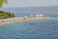 Crowds of people on Golden Cape beach. Golden Cape is the most famous beach in Croatia located on Brac island.