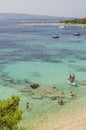 Crowds of people on Golden Cape beach. Golden Cape is the most famous beach in Croatia located on Brac island.