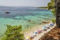 Crowds of people on Golden Cape beach. Golden Cape is the most famous beach in Croatia located on Brac island.