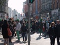 Crowds of people in Irish top hats and green in Dublin, Ireland on St. Patrick`s Day Royalty Free Stock Photo