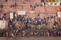 Crowds of people the stairs of the embankment of the river Ganges, Varanasi, India.