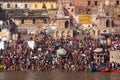 Crowds of people the stairs of the embankment of the river Ganges, Varanasi, India.