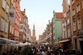 Crowds of people throng Dluga Street, the main thoroughfare through the Old Town of Gdansk, Poland