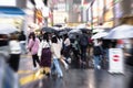 crowds of people with umbrellas on the move in Tokyo, Japan, while it is raining Royalty Free Stock Photo