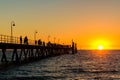 Glenelg Beach jetty full of people at sunset Royalty Free Stock Photo