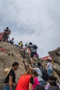Crowds reaching summit of West Peak in Huashan mountain Royalty Free Stock Photo