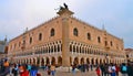 Crowds of tourists exploring Piazza San Marco St. Mark`s Square with Doge Palace in Venice, Italy Royalty Free Stock Photo